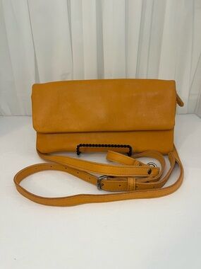 Free People Fold-Over Crossbody Bag in Mustard Yellow